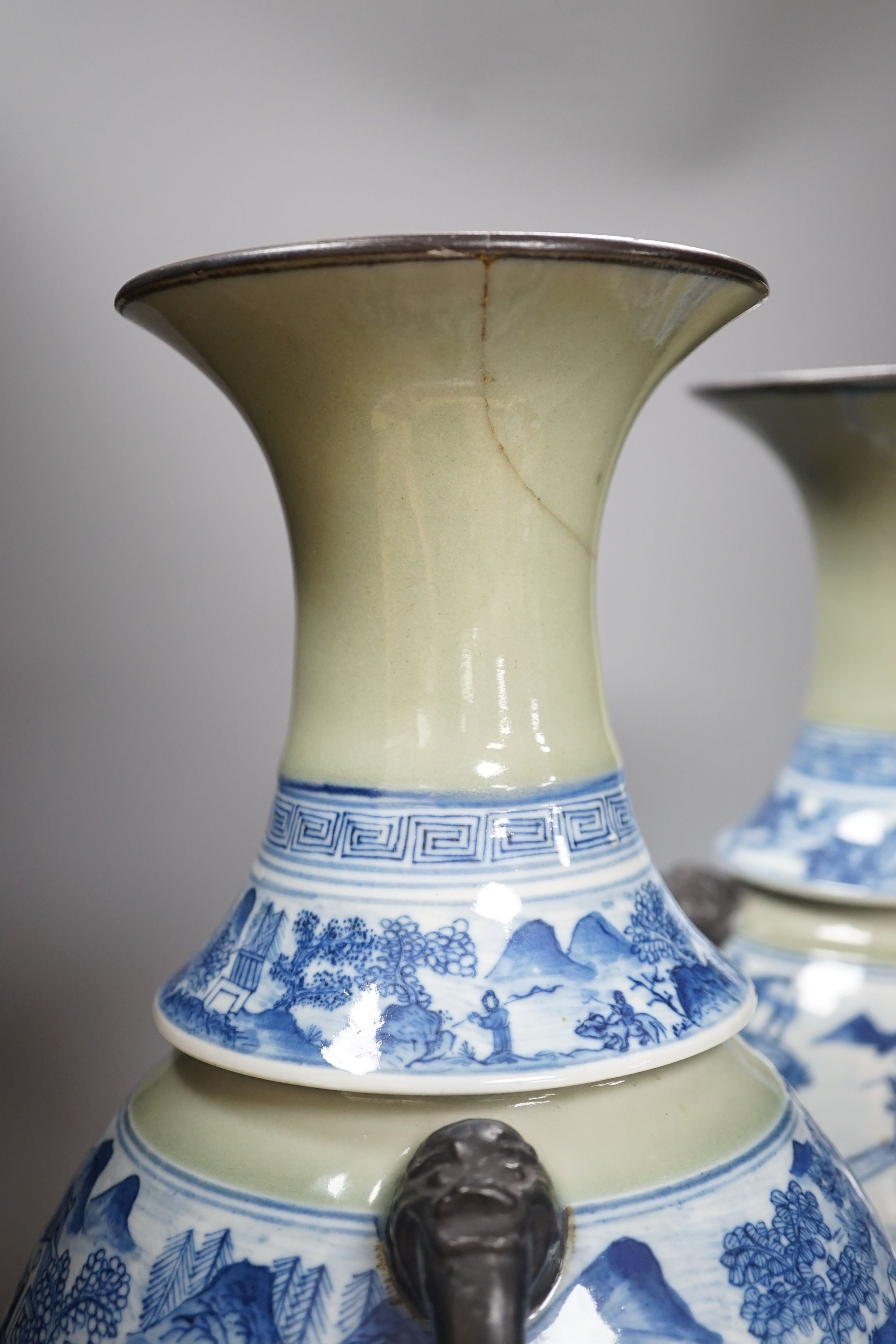 A pair of Chinese celadon ground underglaze blue vases, early 20th century-44cm high.